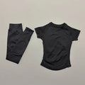 Women's seamless 2-piece workout set — short-sleeve top and high-waist long leggings in Black
